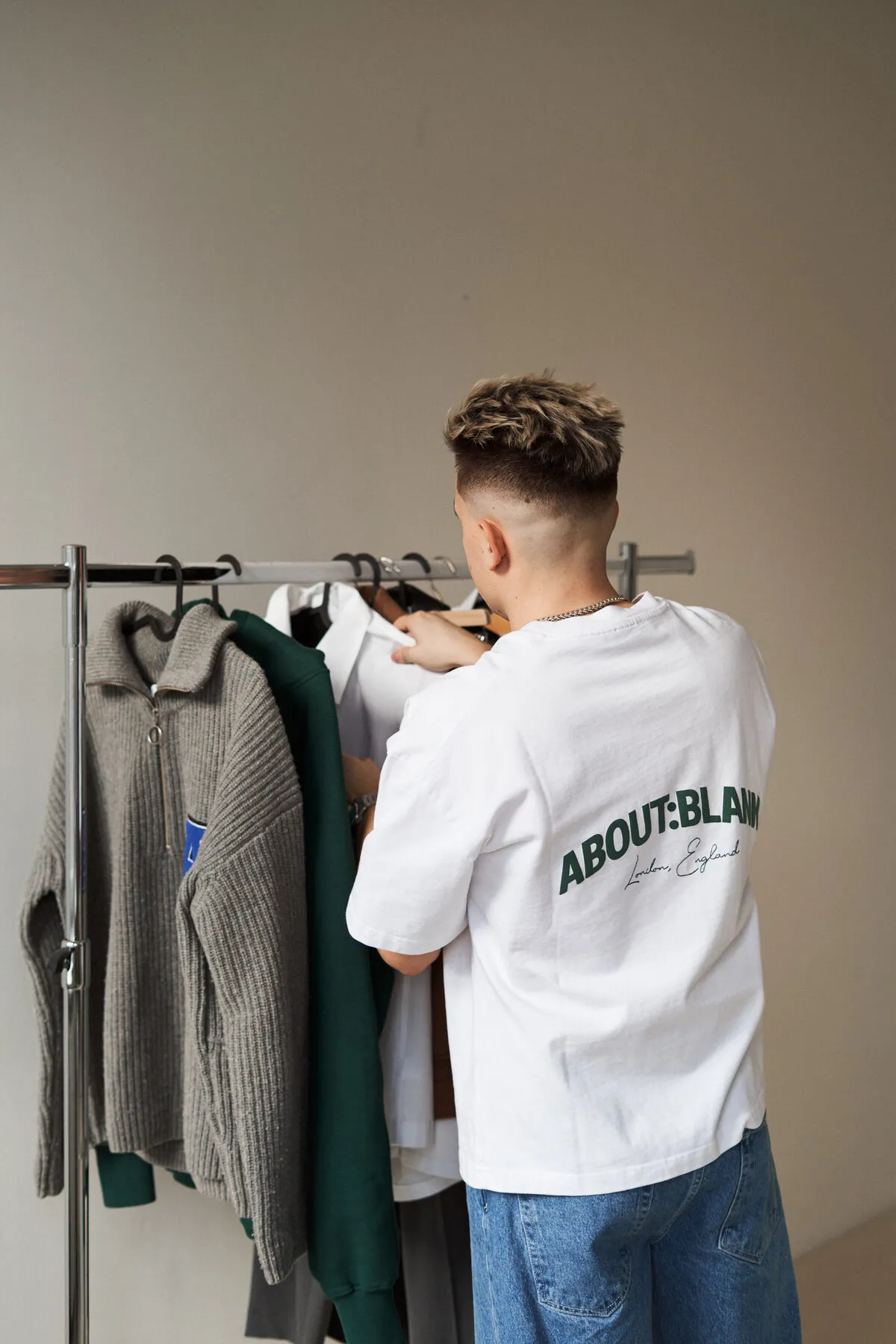 Organizing clothes on a rack